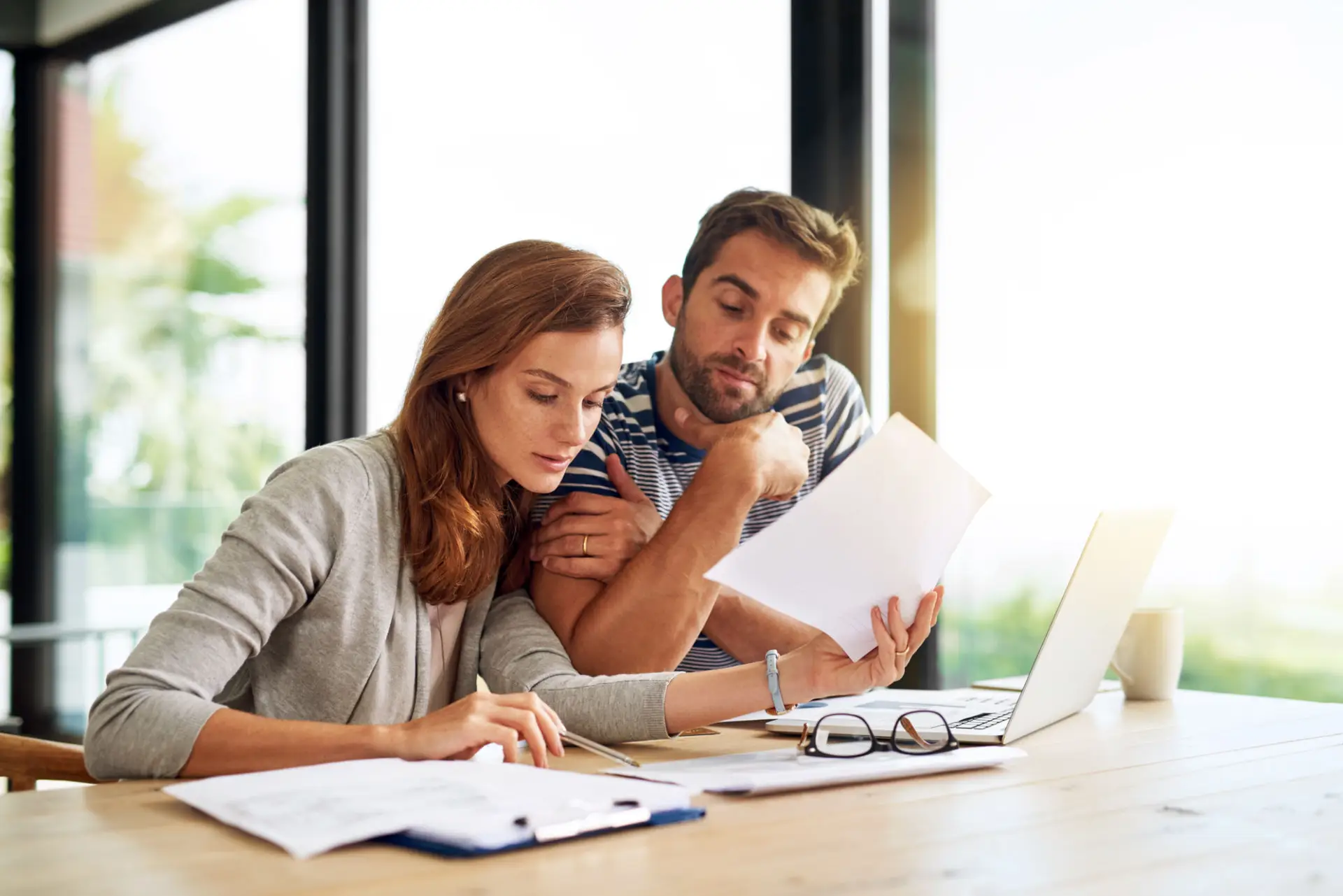 Homeowners discussing refinance options